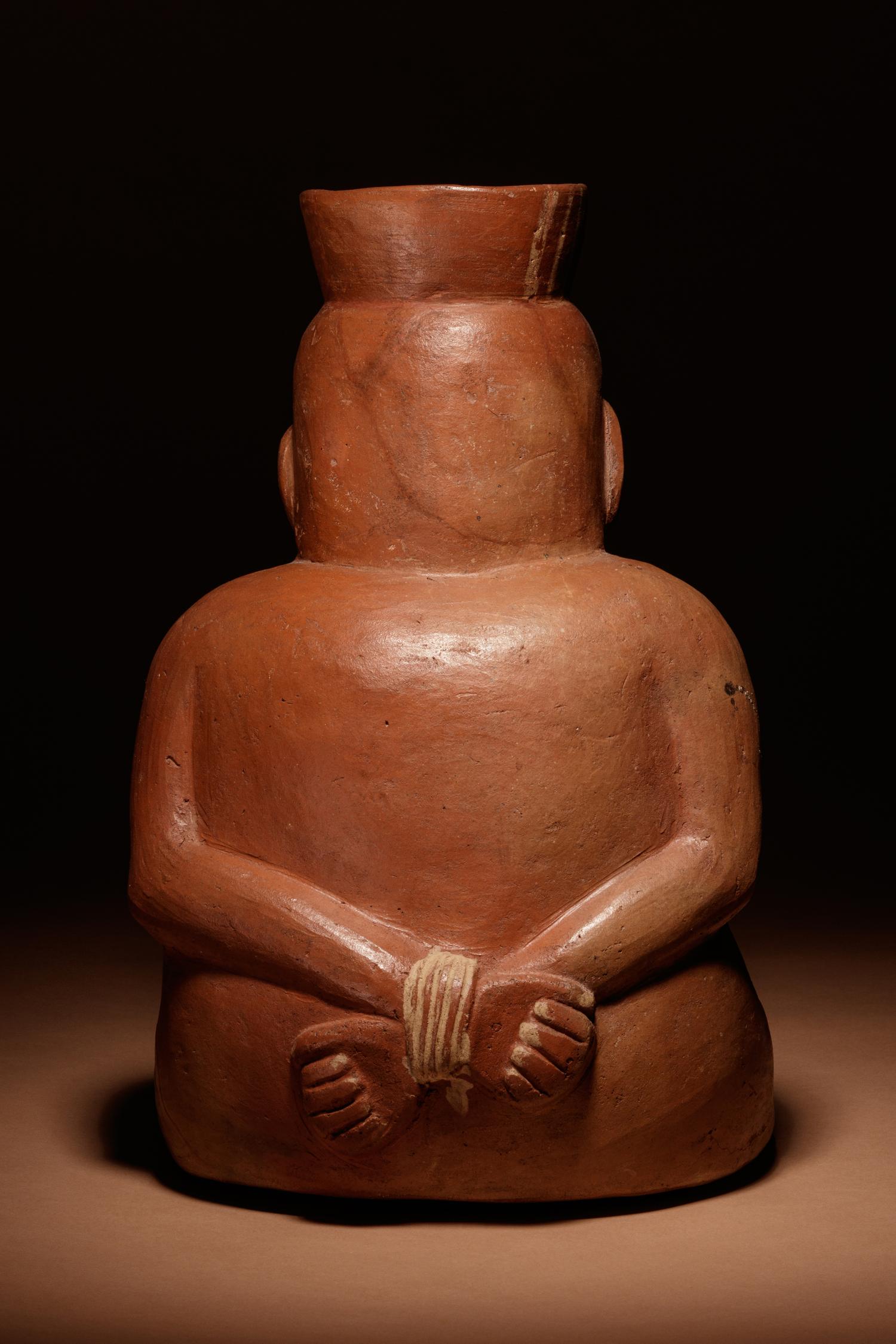 A Moche Terracotta Vessel Depicting a Bound Captive