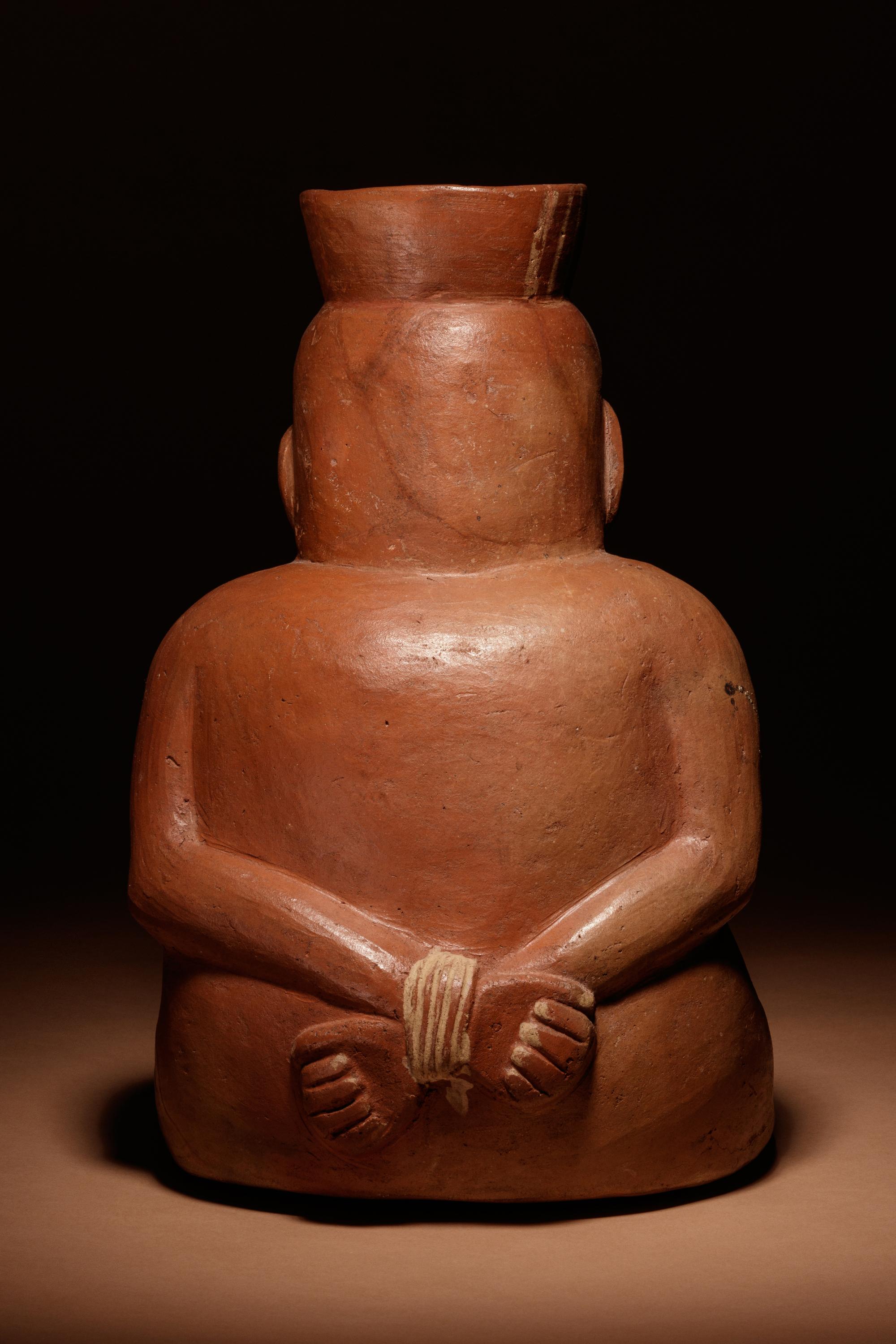 A Moche Terracotta Vessel Depicting a Bound Captive