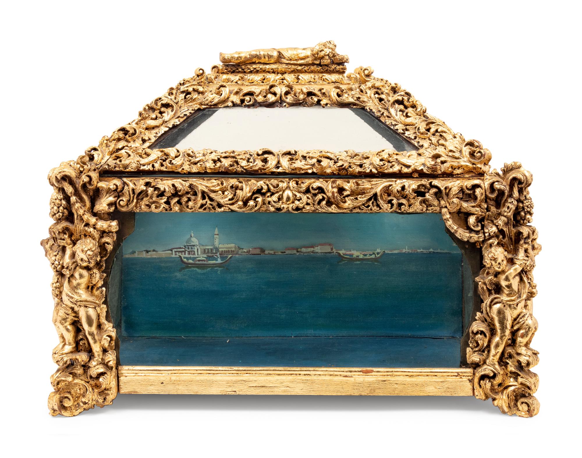 A Baroque Style Carved Giltwood Table Vitrine