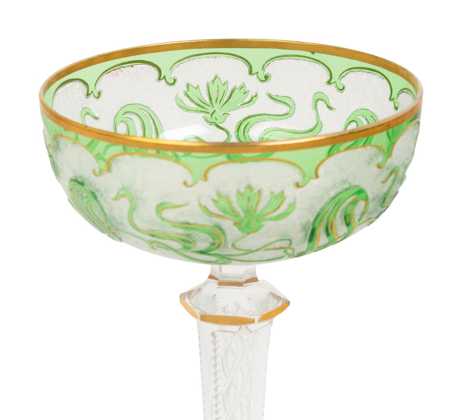 A Group of Three Art Nouveau Parcel-Gilt and Cut-to-Clear Glass Champagne Coupes
