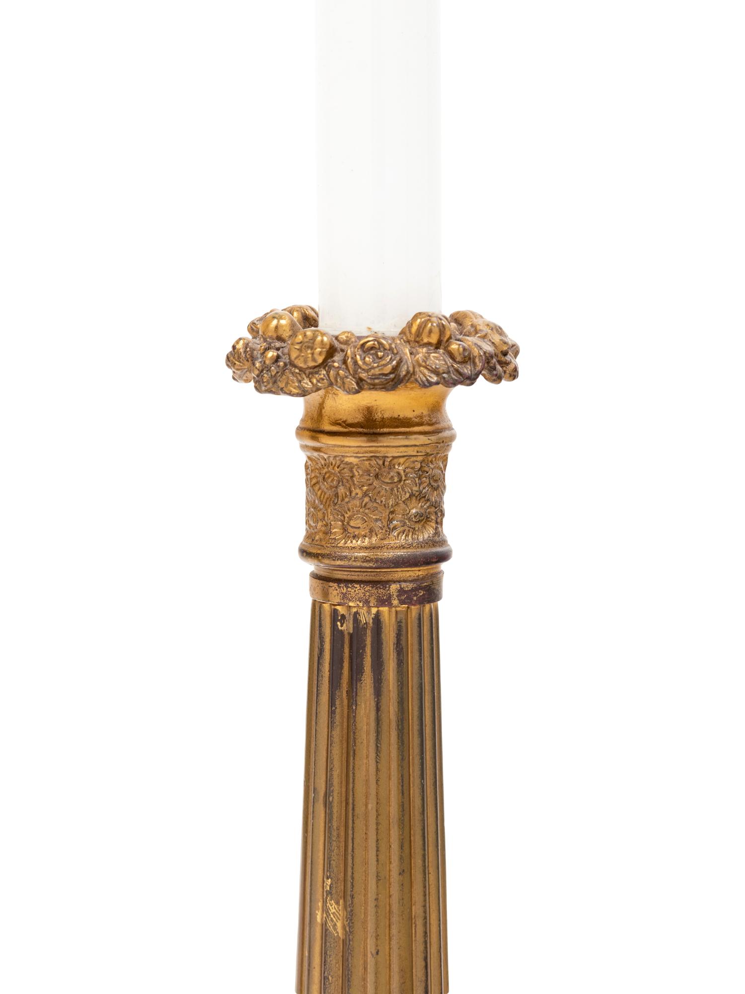 A Pair of French Gilt Metal Candlesticks Mounted as Lamps