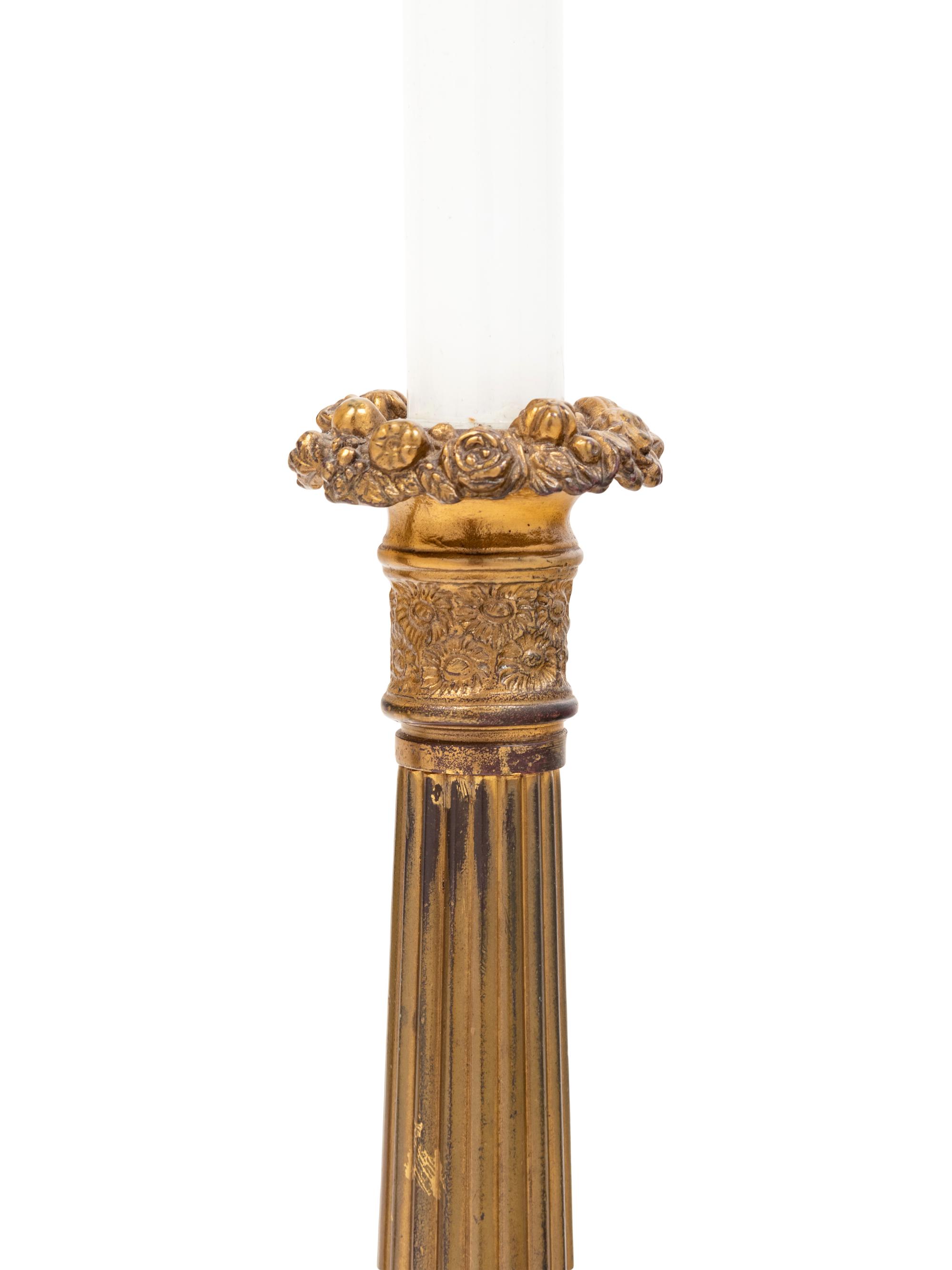 A Pair of French Gilt Metal Candlesticks Mounted as Lamps