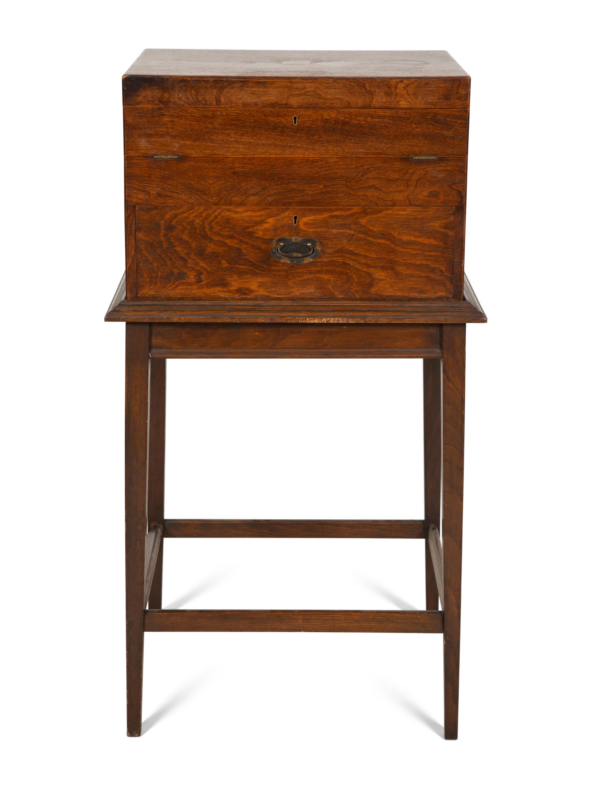 An Extensive Silver-Plate Flatware and Tea Service in a Fitted Wooden Case on Mahogany Stand