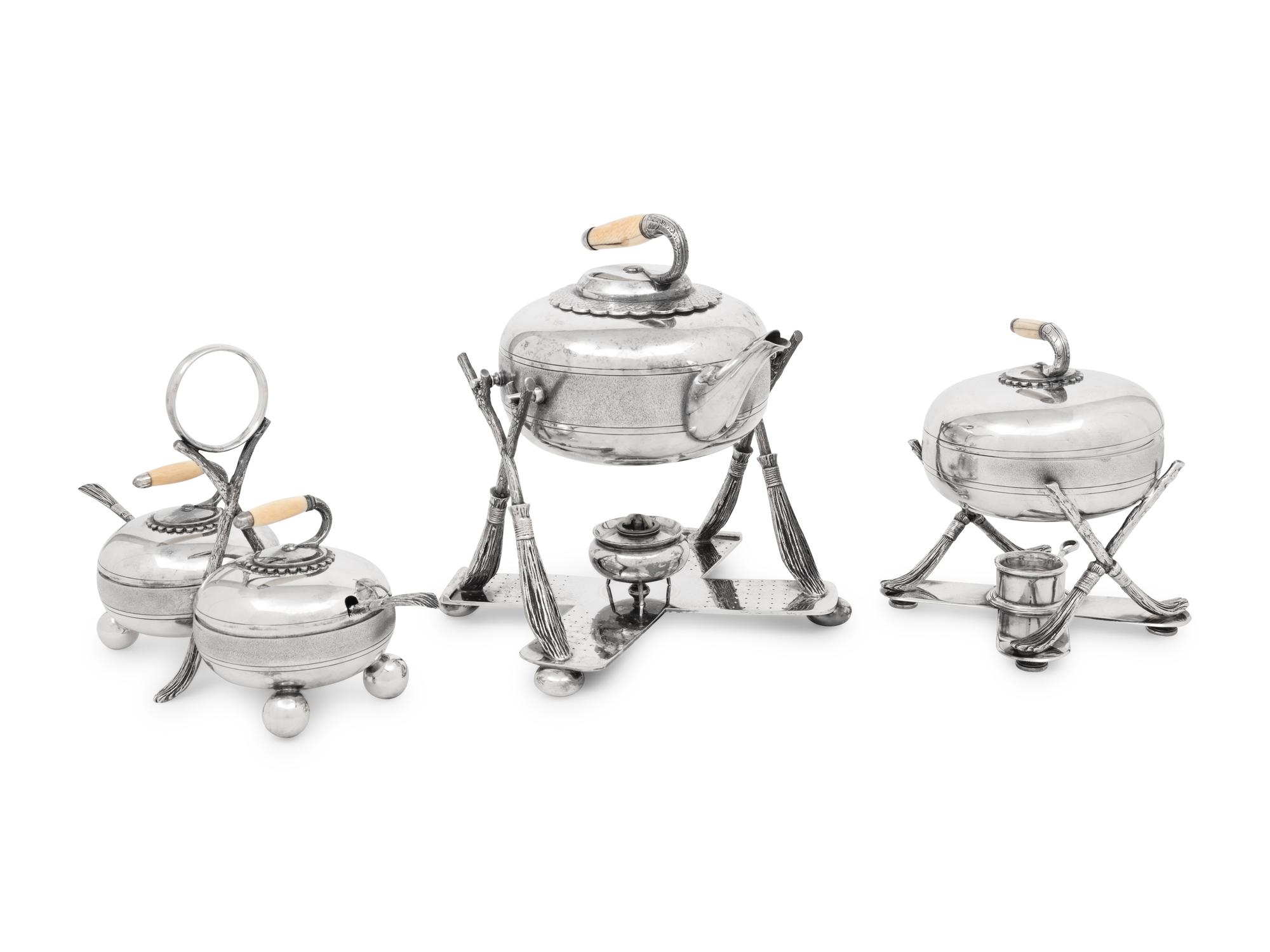 A Group of Three Curling Stone-Form Silver-Plate Table Articles