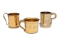 Three American Silver-Gilt Mugs