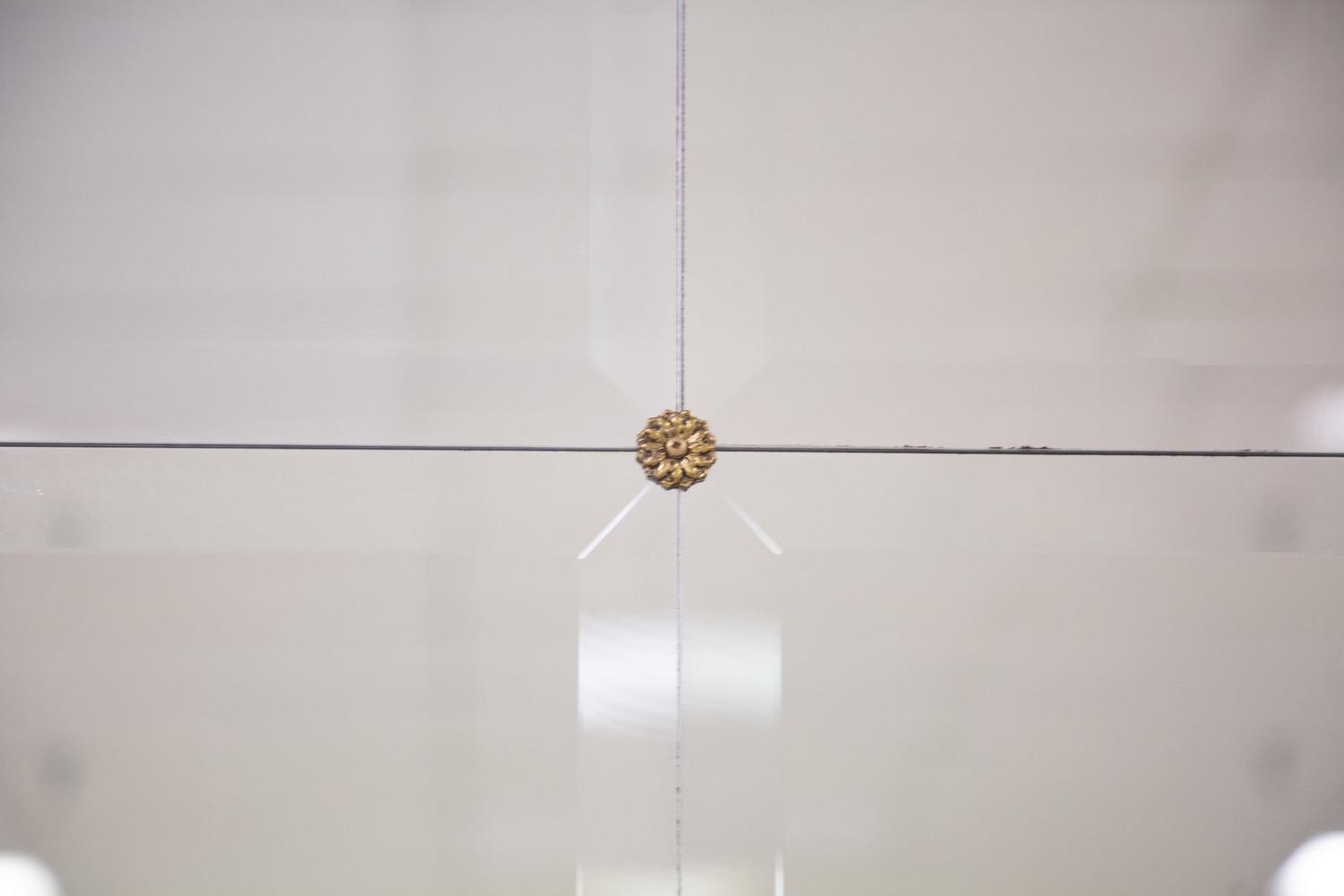 An Oversized Giltwood Mirror