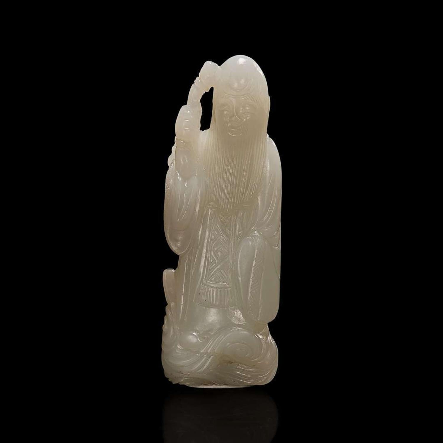 A Chinese pale celadon jade figure of Shoulao 青白玉壽老