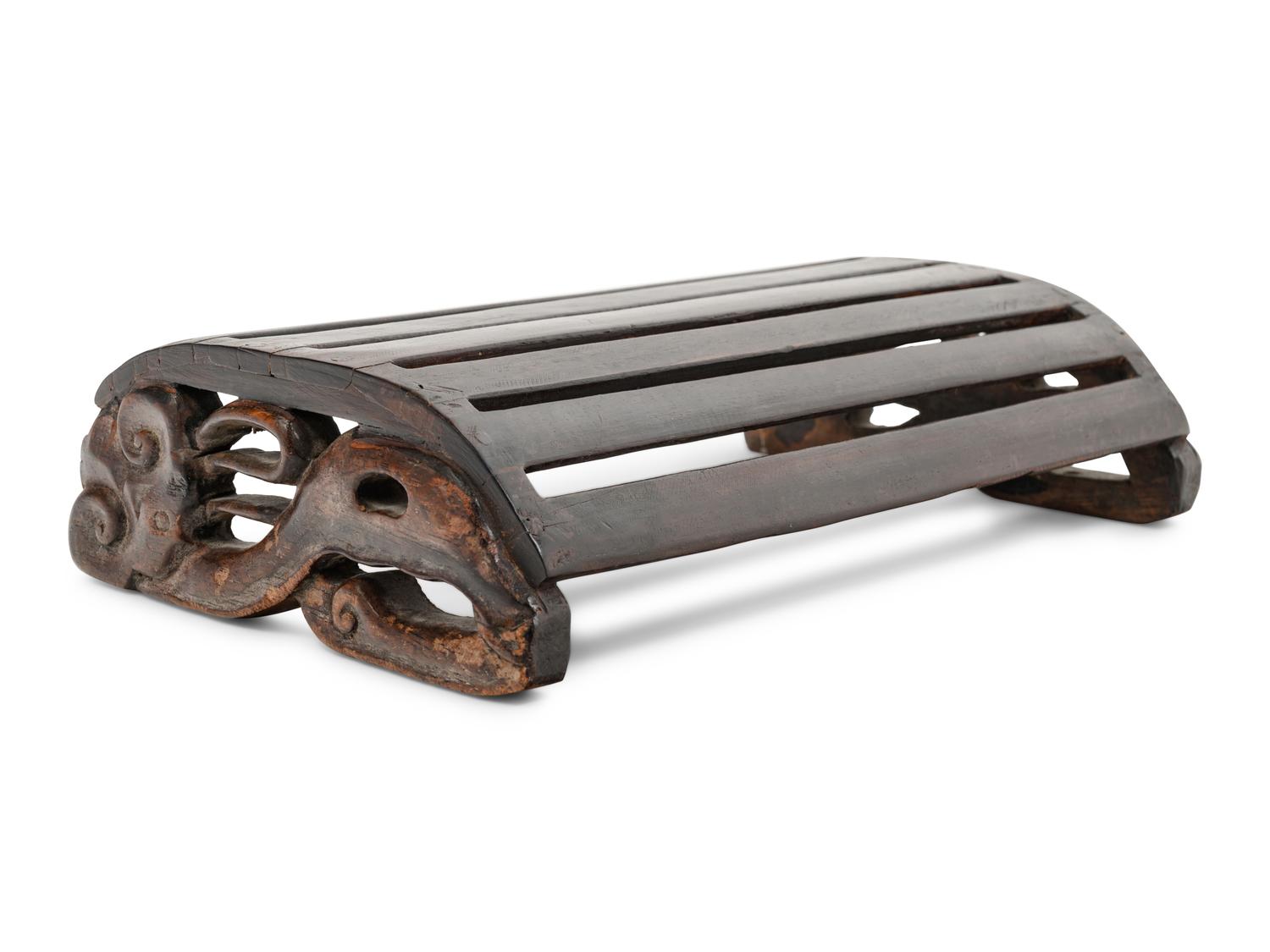 A Chinese Hardwood 'Demi-Lune' Foot Rest