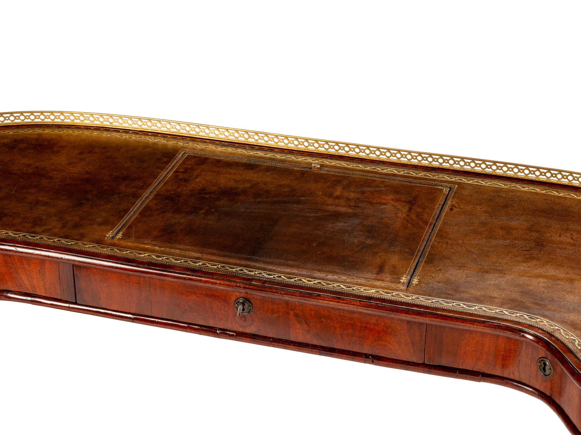 An English Brass-Mounted Mahogany Kidney-Shaped Reading Table — 19TH CENTURY