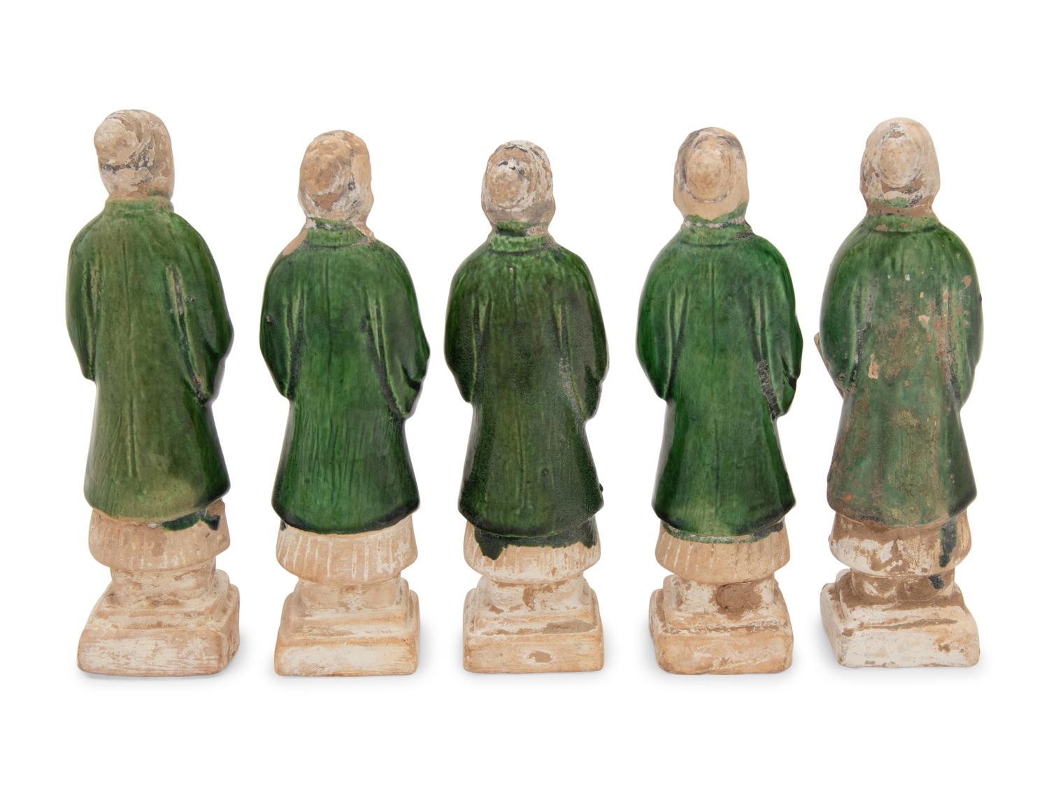 A Set of Five Chinese Green Glazed Porcelain Figures