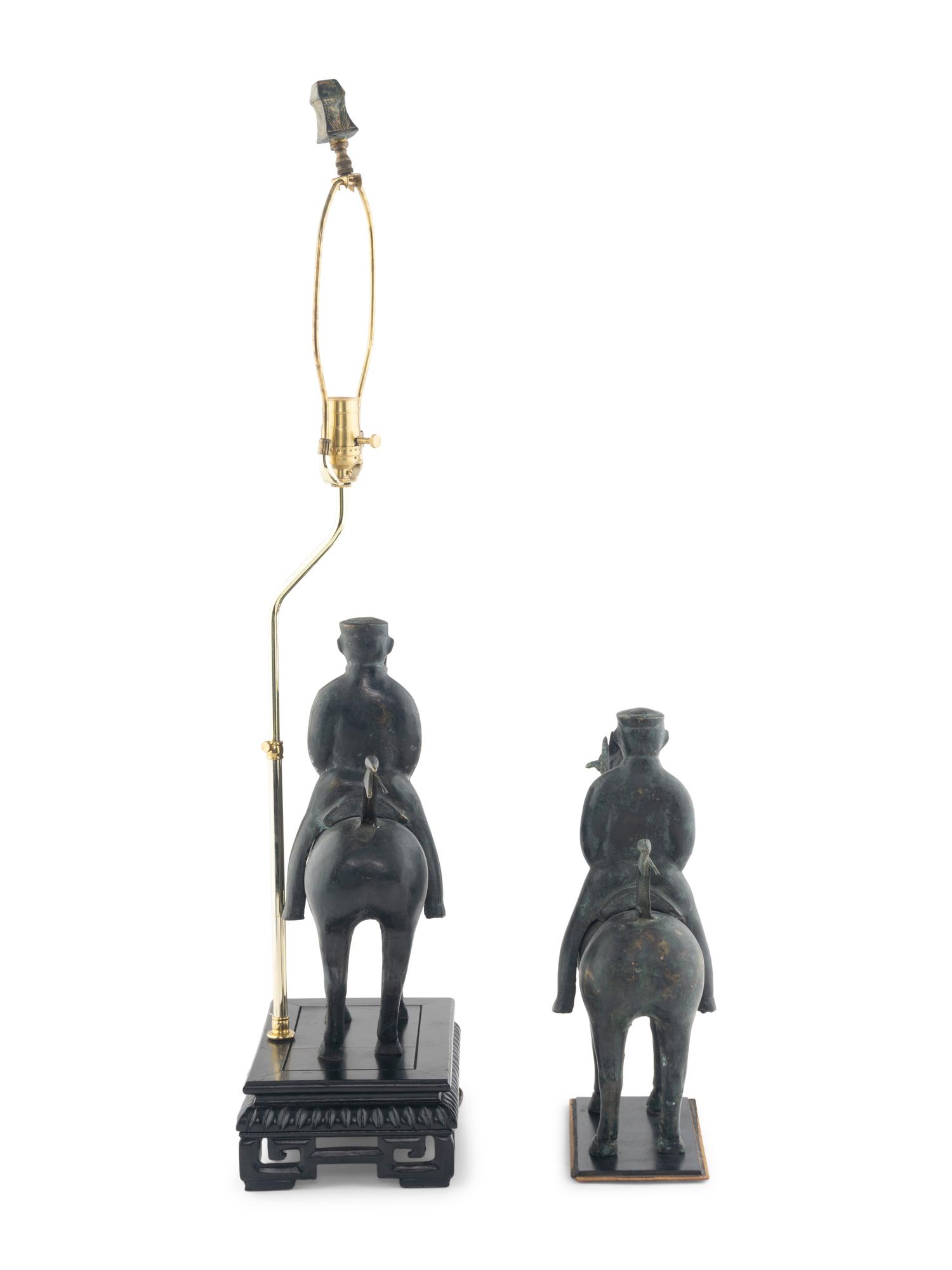 A Pair of Chinese Cast Metal Equestrian Figures Mounted as Lamps