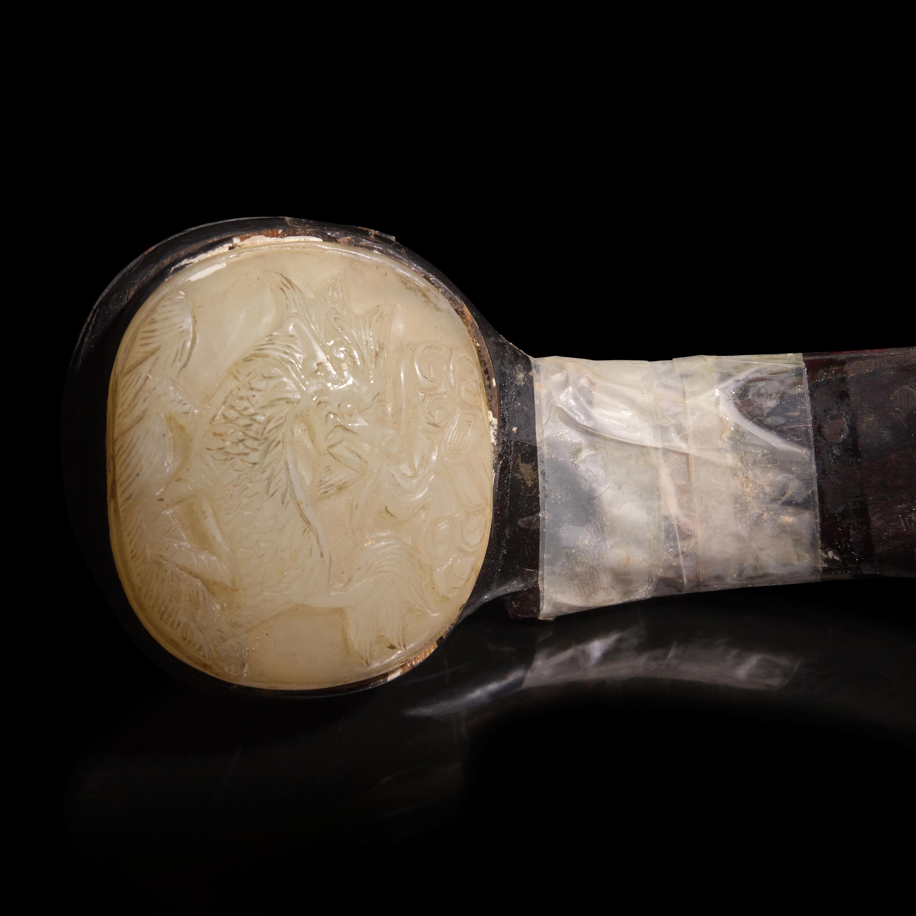 A Chinese Jade Inset Hardwood Ruyi Scepter, Late 19th-20th Century — 晚清-民國 白玉三鑲硬木如意