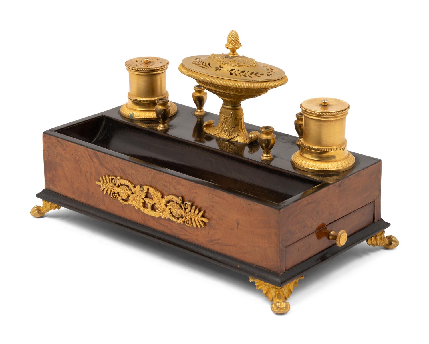 A French Gilt Bronze and Parcel Ebonized Burlwood Encrier