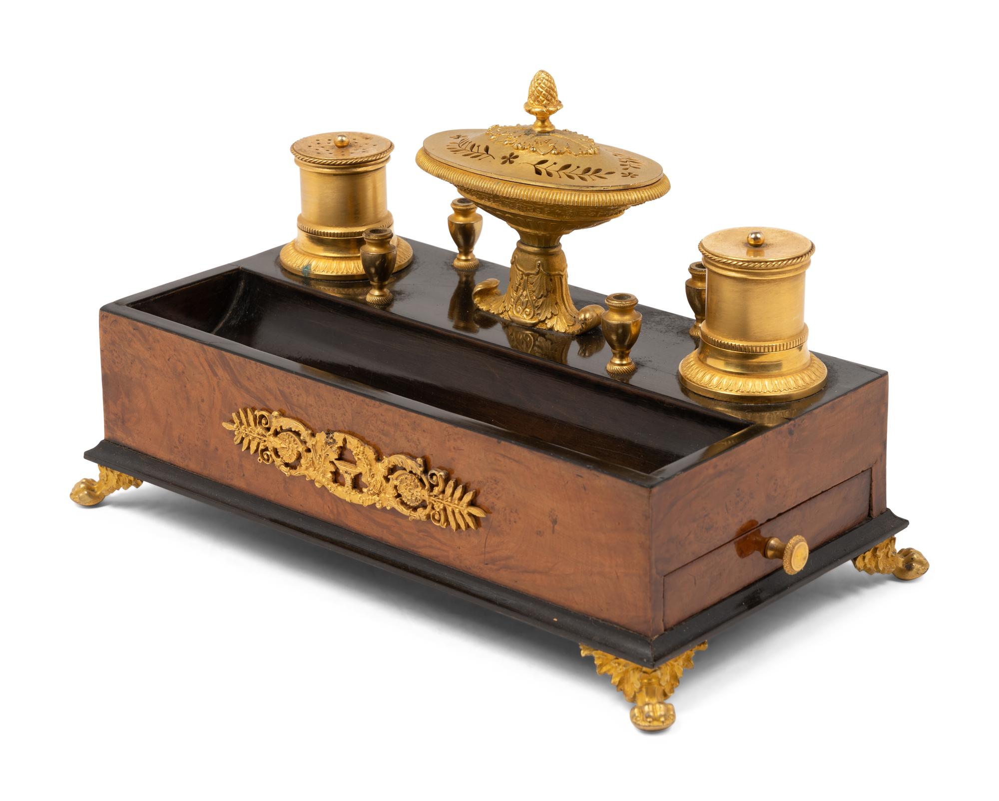 A French Gilt Bronze and Parcel Ebonized Burlwood Encrier