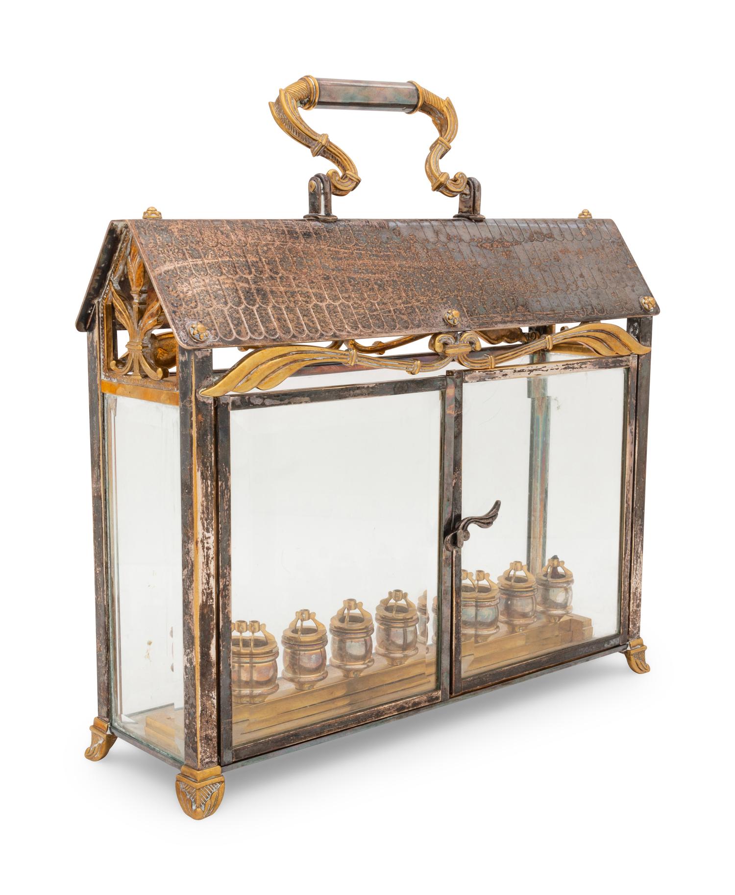 A Yossi Swed Silver, Silver-Gilt and Glass Menorah