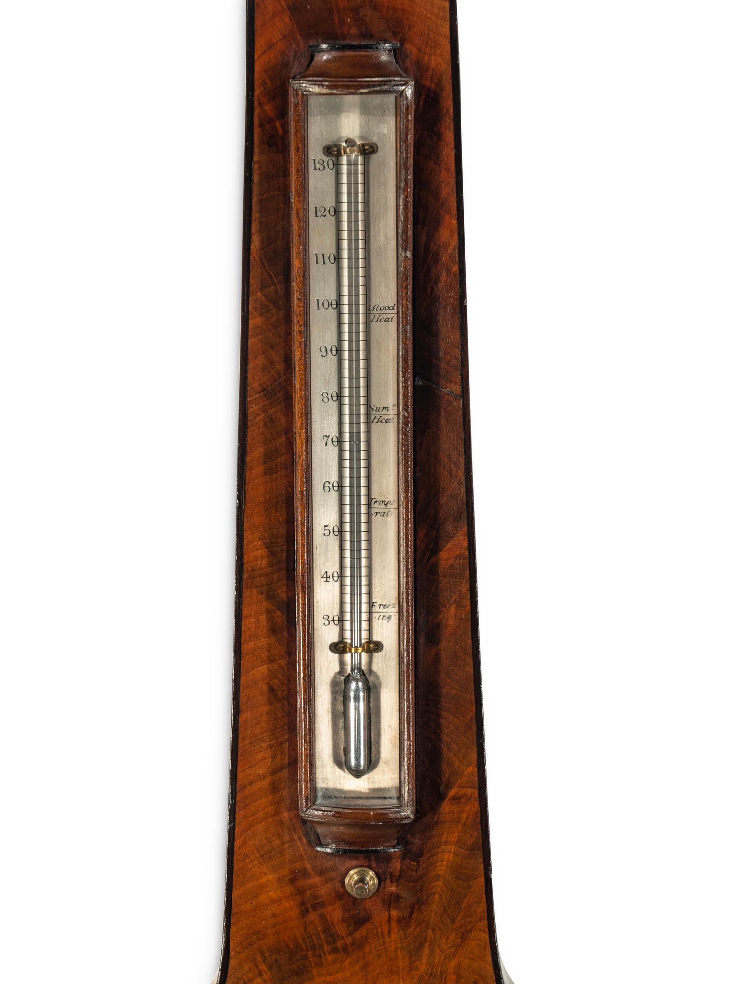 An English Mahogany Wheel Barometer