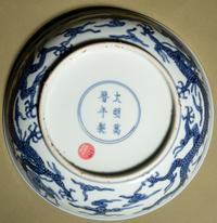 A Blue and White Porcelain 'Dragon and Peach' Plate