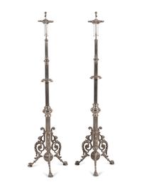 A Pair of French Neoclassical Silvered Bronze Telescoping Floor Lamps