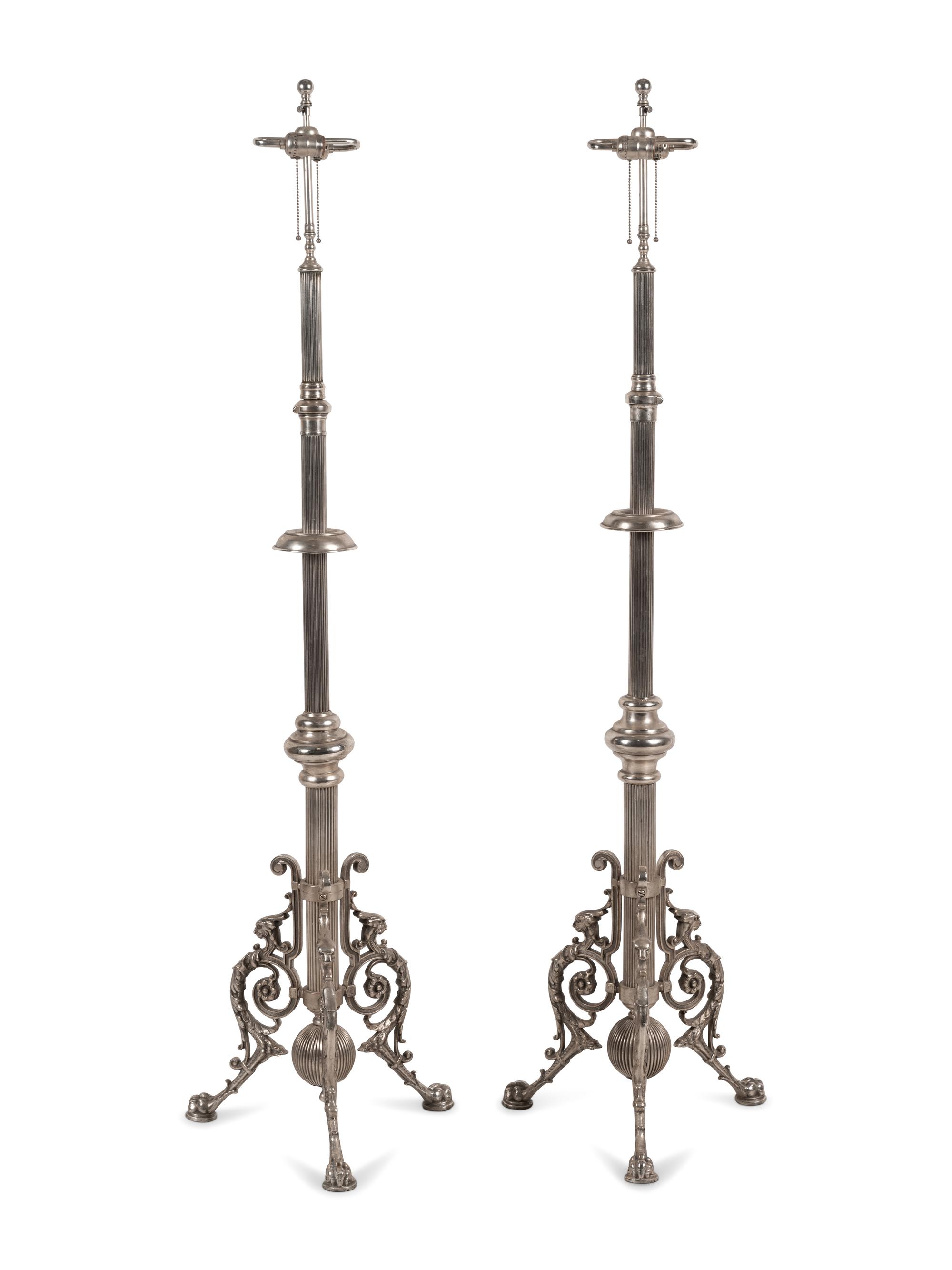 A Pair of French Neoclassical Silvered Bronze Telescoping Floor Lamps