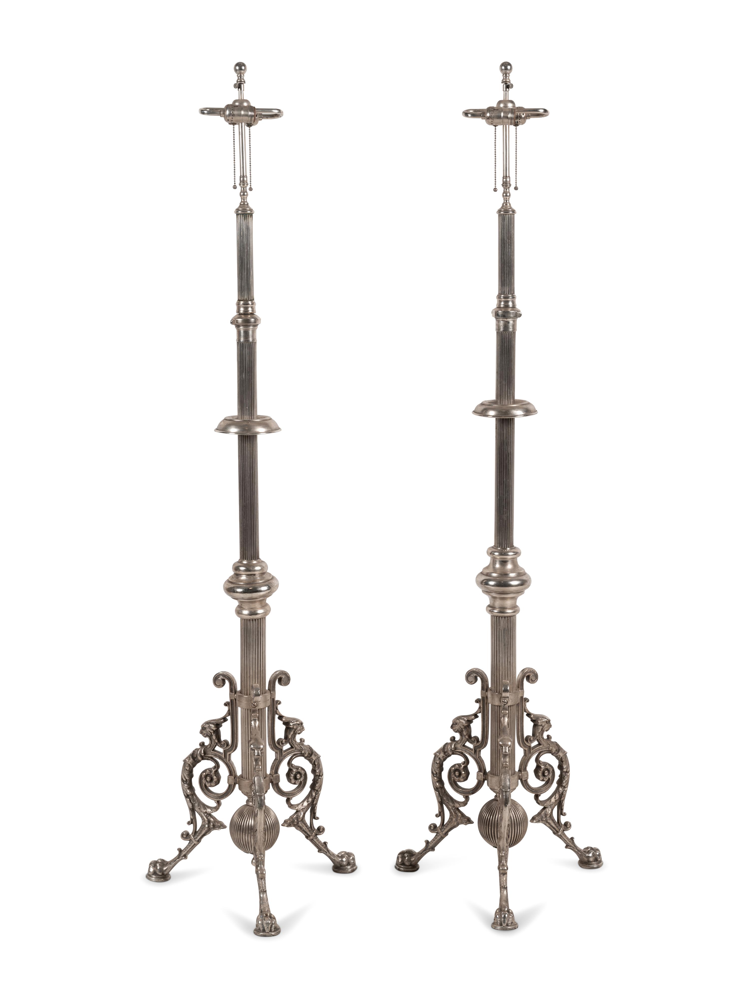 A Pair of French Neoclassical Silvered Bronze Telescoping Floor Lamps