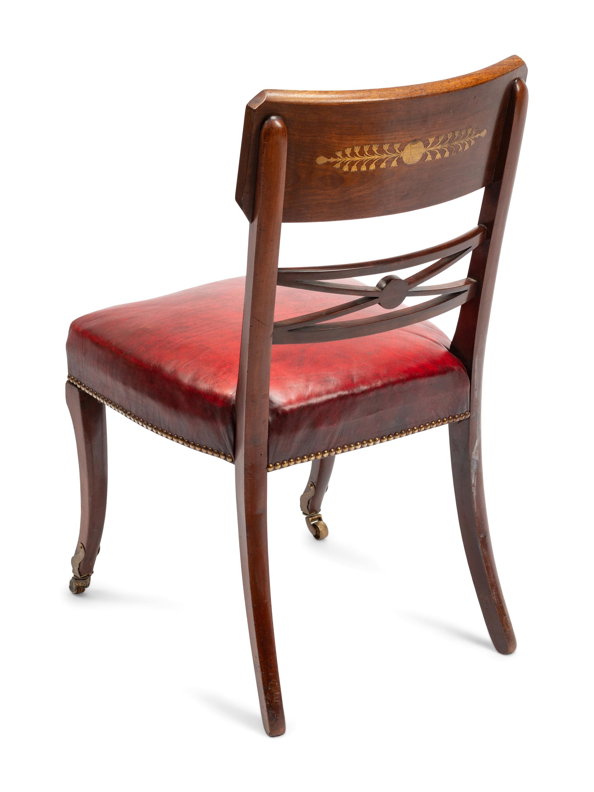A Set of Twelve Baltic Neoclassical Style Leather-Upholstered Mahogany Dining Chairs