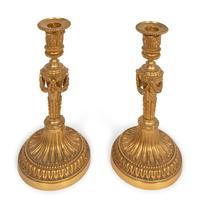 A Pair of Louis XVI Style Gilt-Bronze Candlesticks