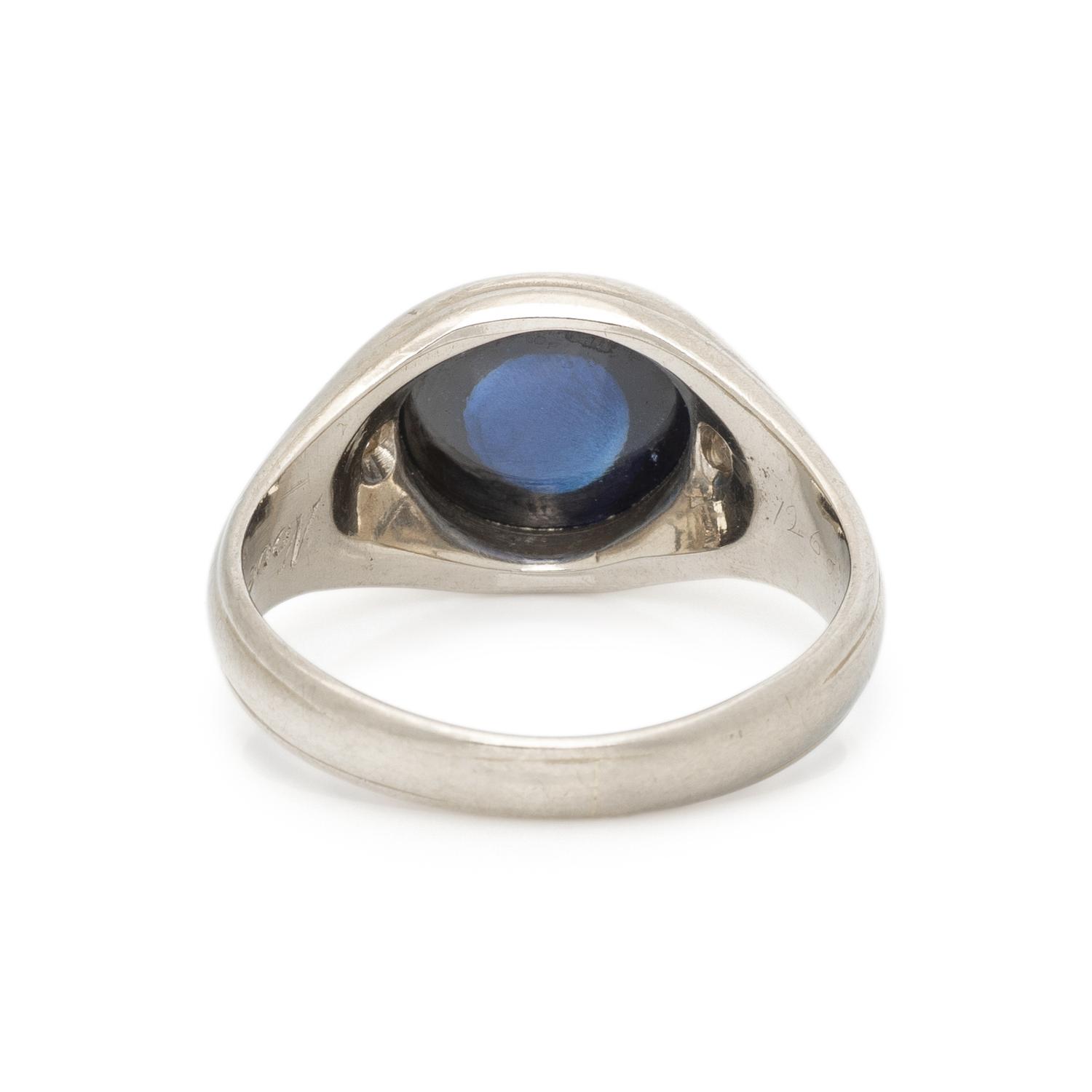 WHITE GOLD, SYNTHETIC SAPPHIRE, AND DIAMOND RING