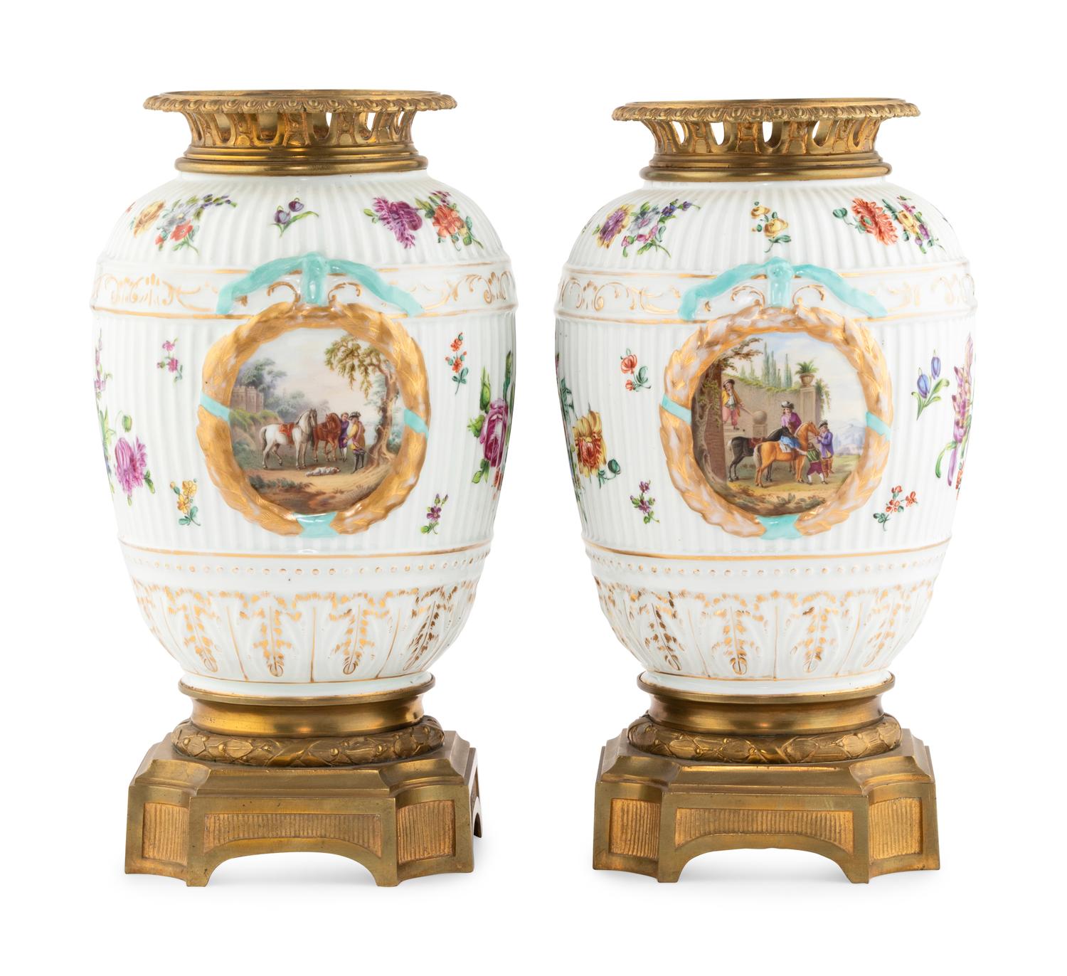 A Pair of German Gilt Bronze Mounted Porcelain Urns