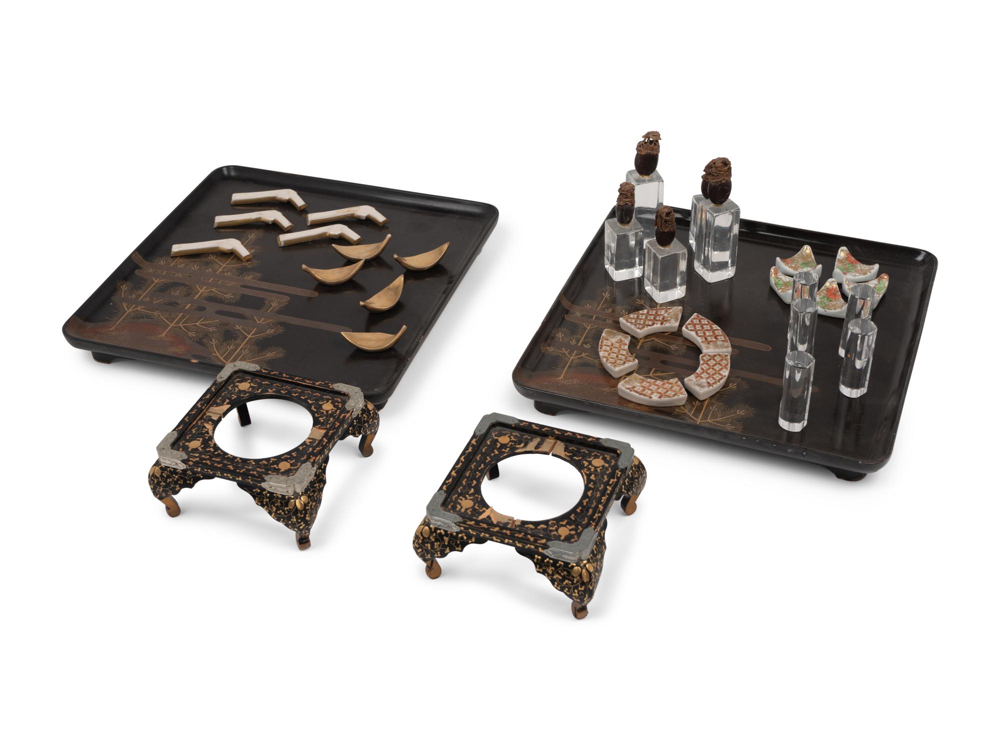 Two Japanese Lacquered Trays with Table Articles