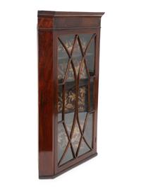 An George III Mahogany Hanging Corner Cabinet — 19TH CENTURY