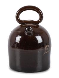 An Ohio Stoneware Albany Slip Harvest Jug