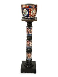 An Imari Porcelain Jardiniere on an Ebonized Pedestal with Imari Porcelain Mounts — 19TH/20TH CENTURY