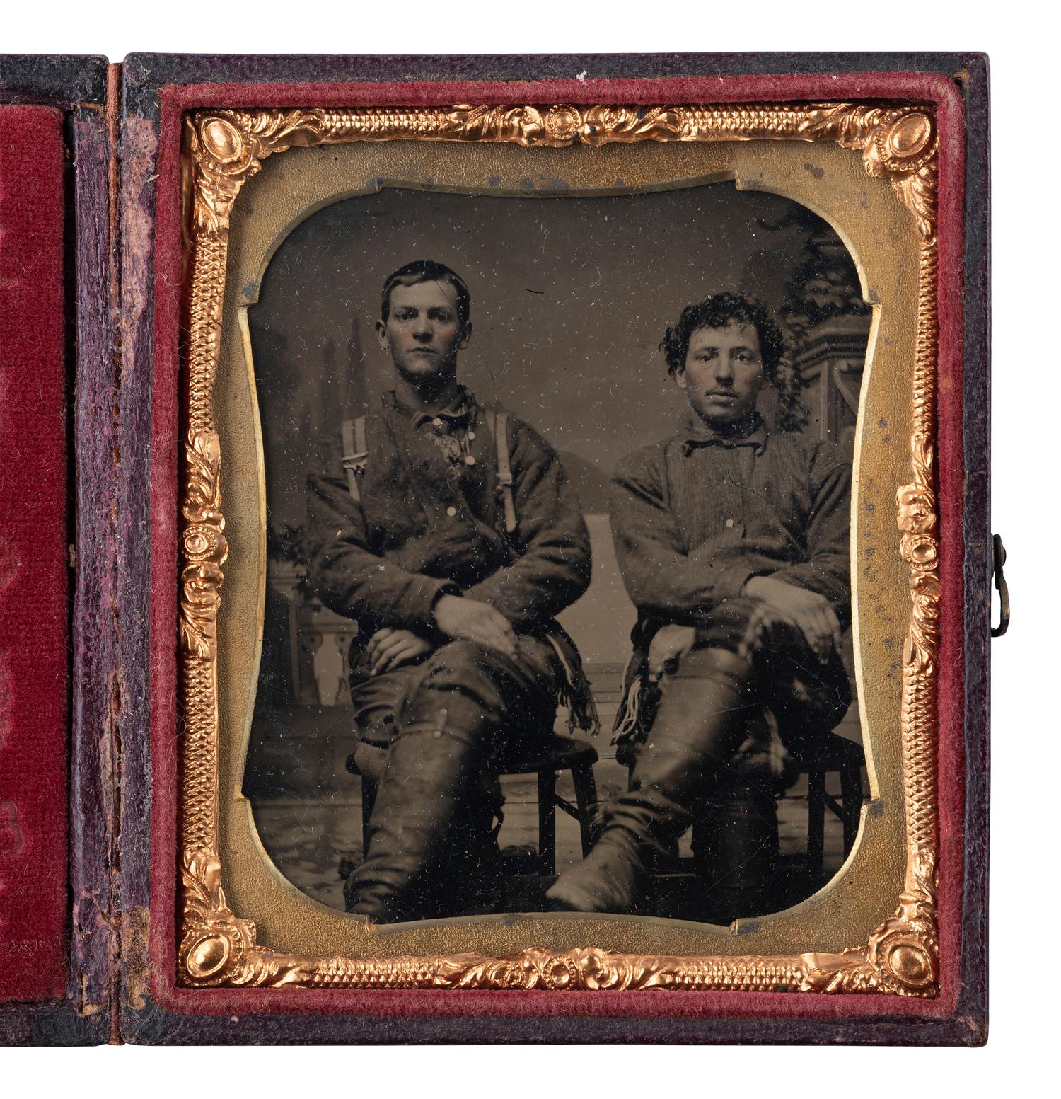[EARLY PHOTOGRAPHY]. 2 sixth plate tintypes of civilians, incl. young men in boots & drummer boy.