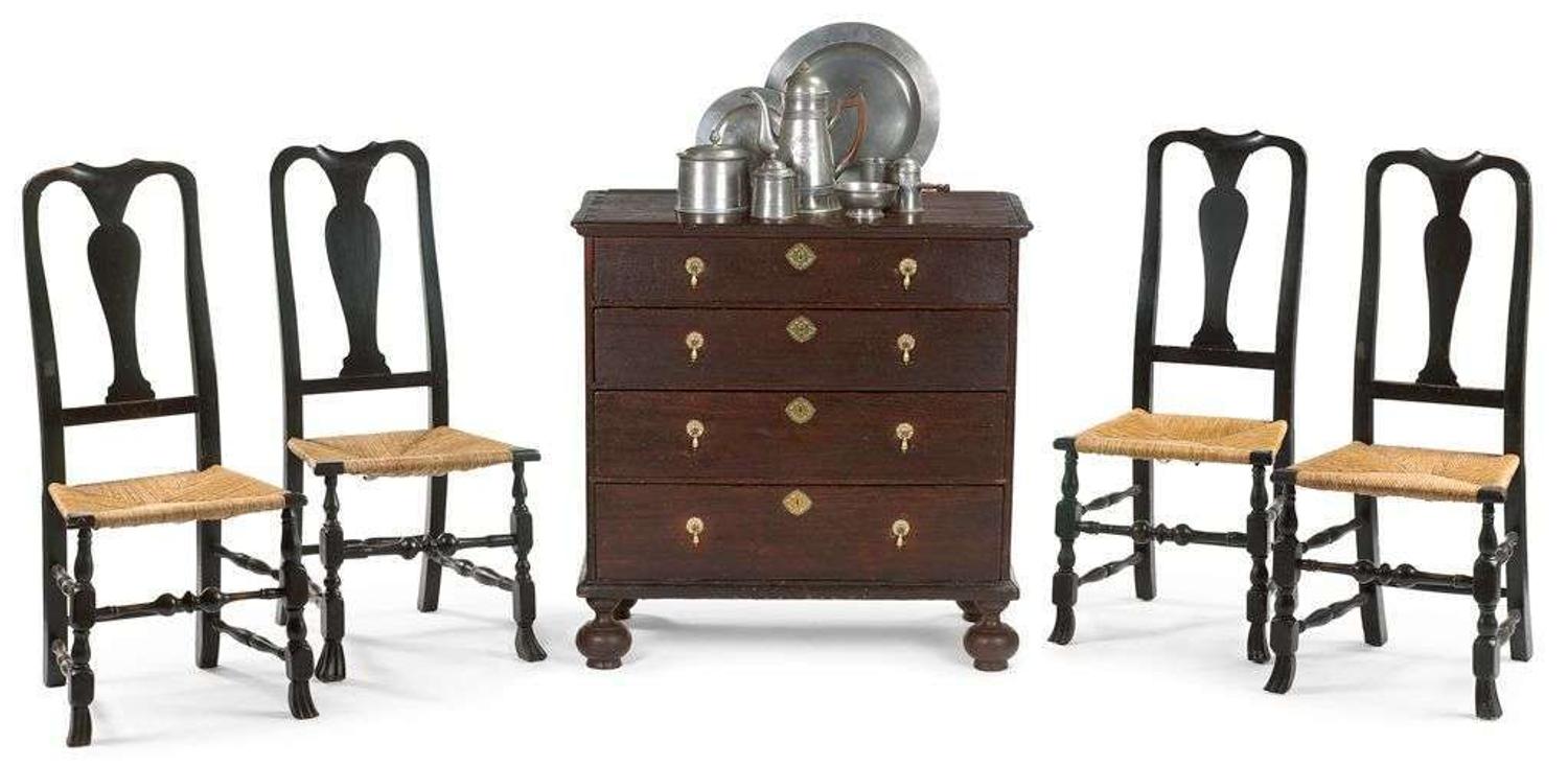 Four black-painted Queen Anne side chairs first half 18th century