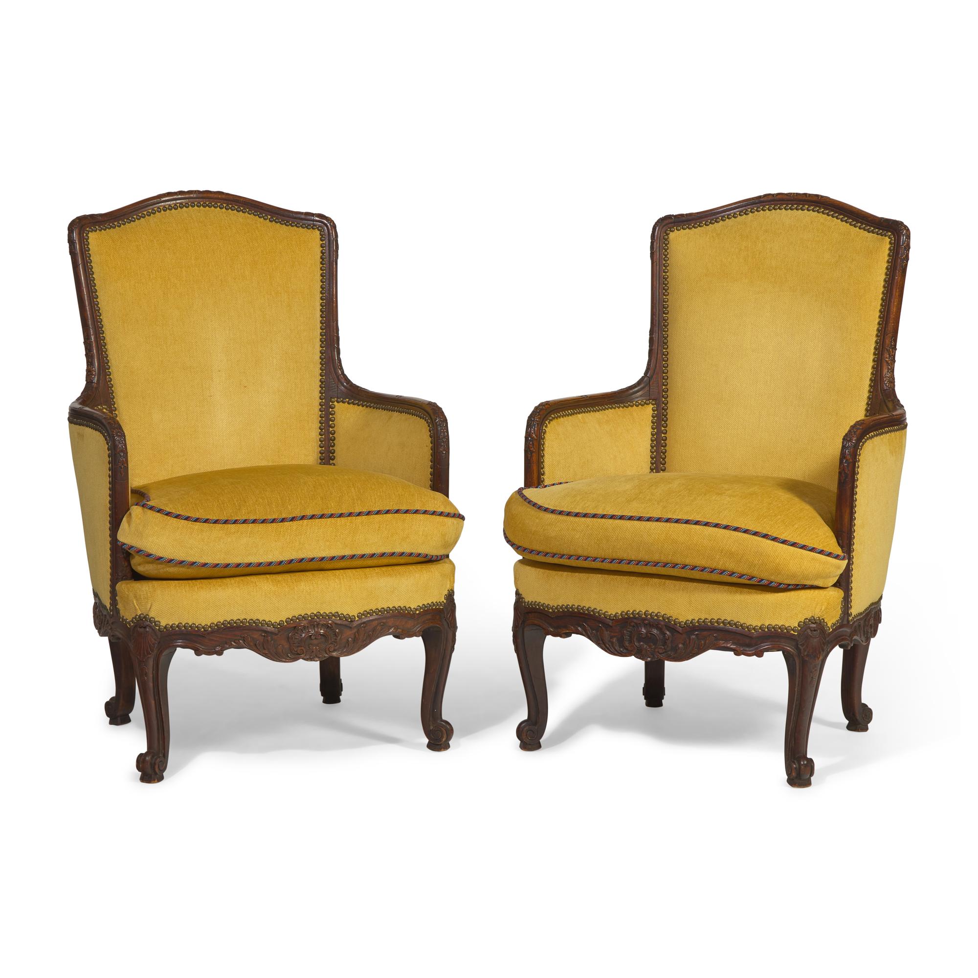 A Pair of Louis XV Style Carved Oak Bergerès