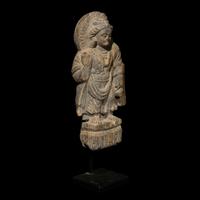 A Gandharan Grey Schist Standing Figure of Bodhisattva Maitraya, 3rd-5th Century