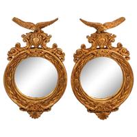 A Pair of Regency Style Giltwood Bullseye Mirrors