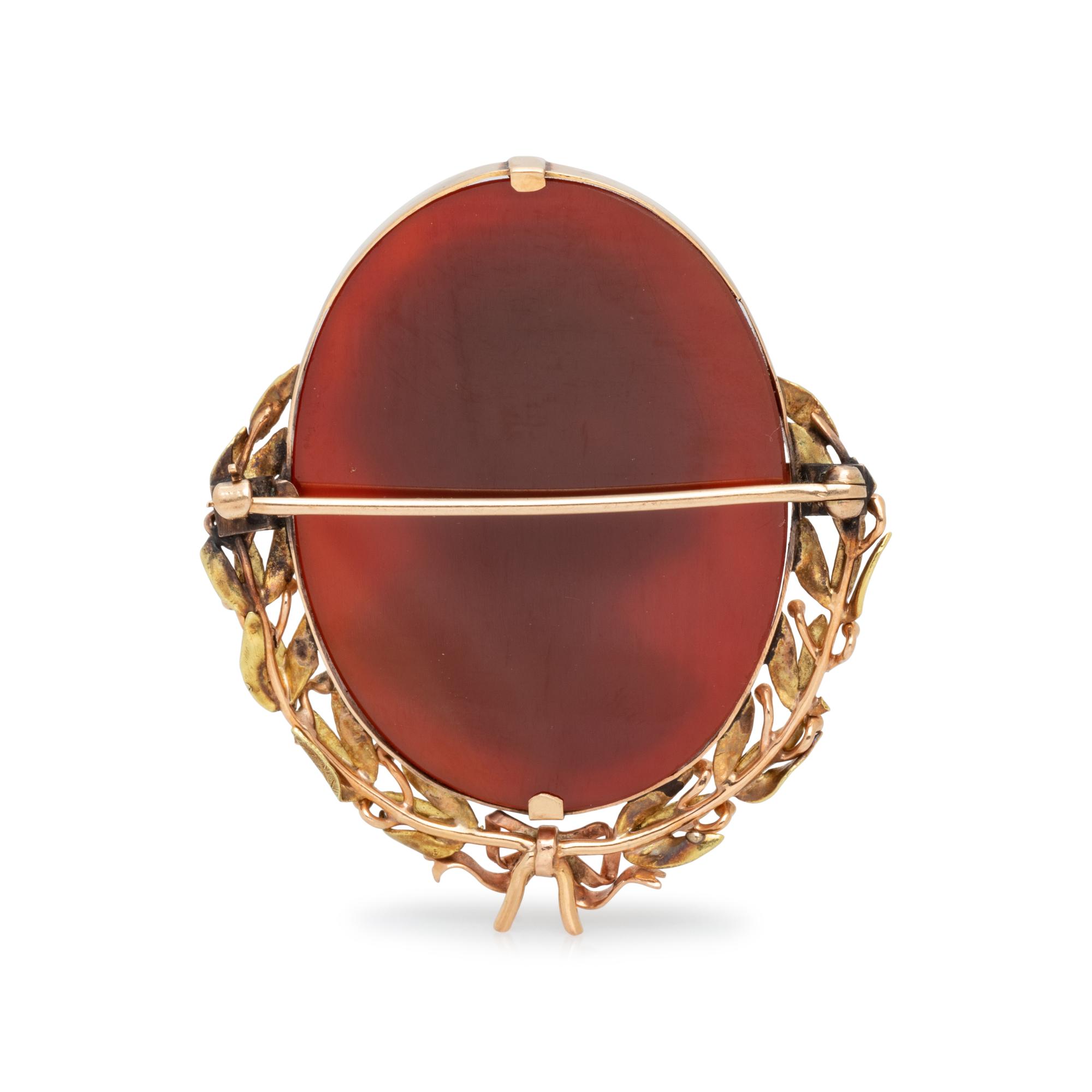 BICOLOR GOLD AND CAMEO BROOCH