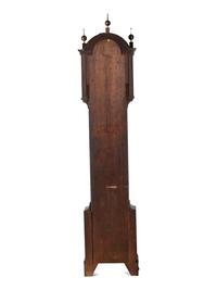A Federal Carved and Inlaid, Brass-Mounted Mahogany Tall Case Clock