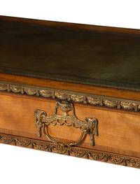 An English Gilt Bronze Mounted Satinwood Writing Table in the Louis XVI Taste