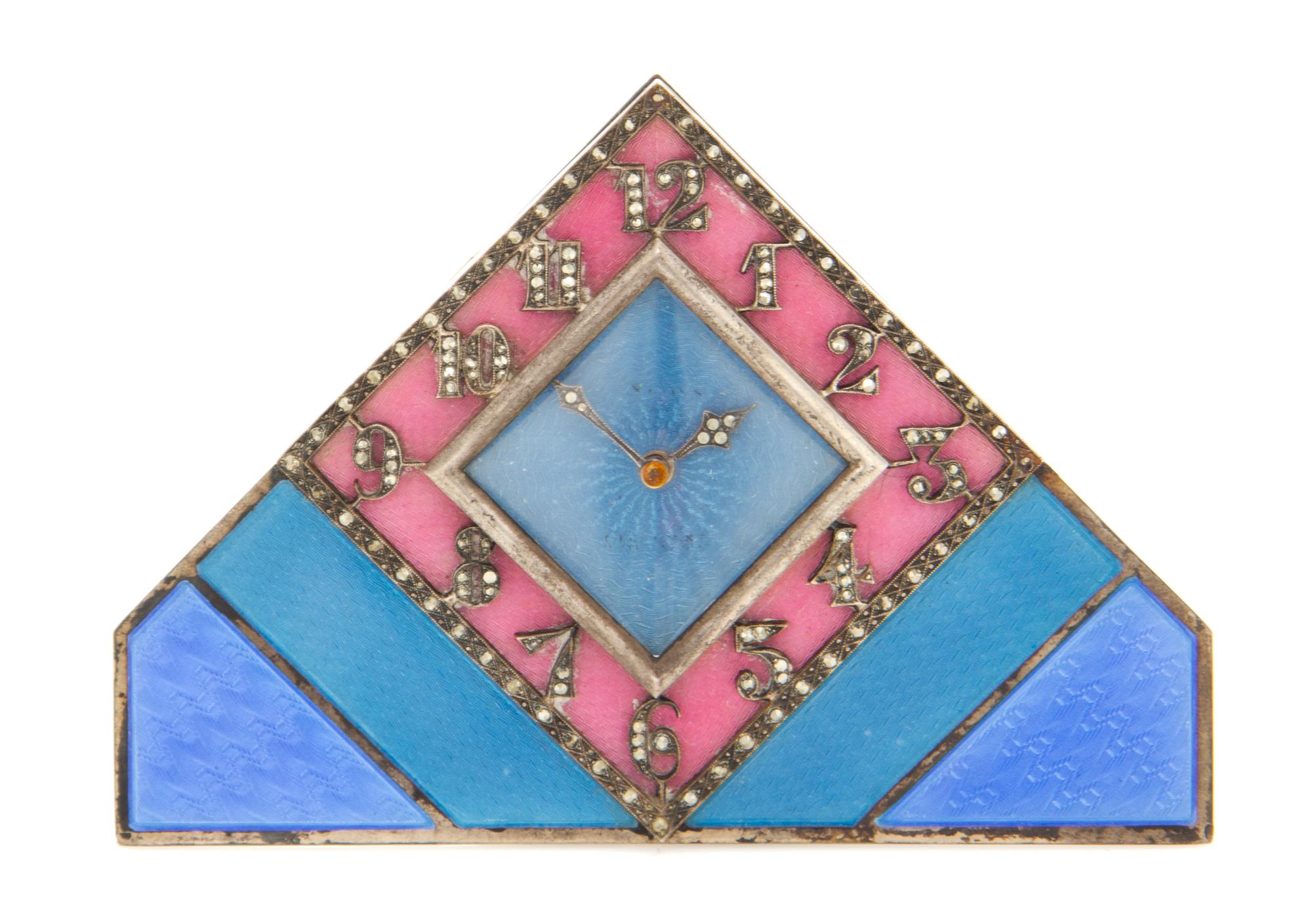 A Swiss Art Deco Silver and Guilloche Enamel Clock, First Half 20th Century, of triangular form, the diamond shaped dial with Arabic nu