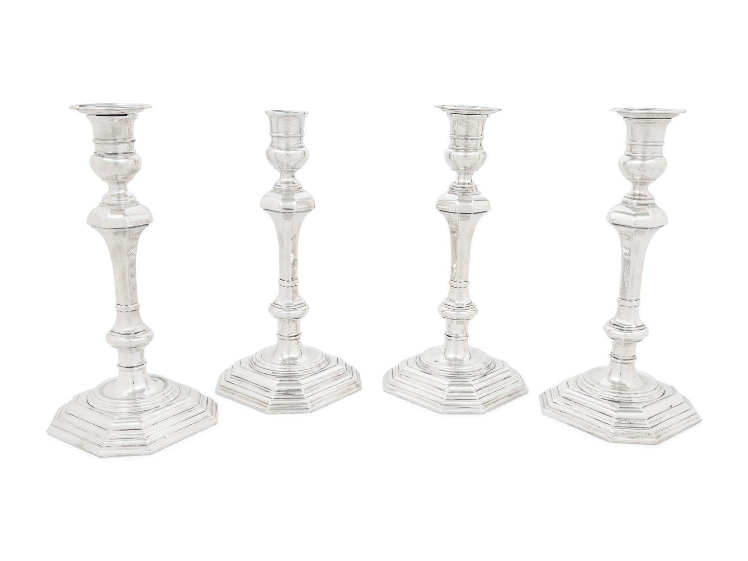 A Set of Four English Silver Candlesticks