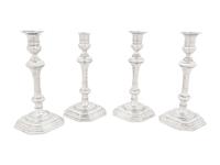 A Set of Four English Silver Candlesticks