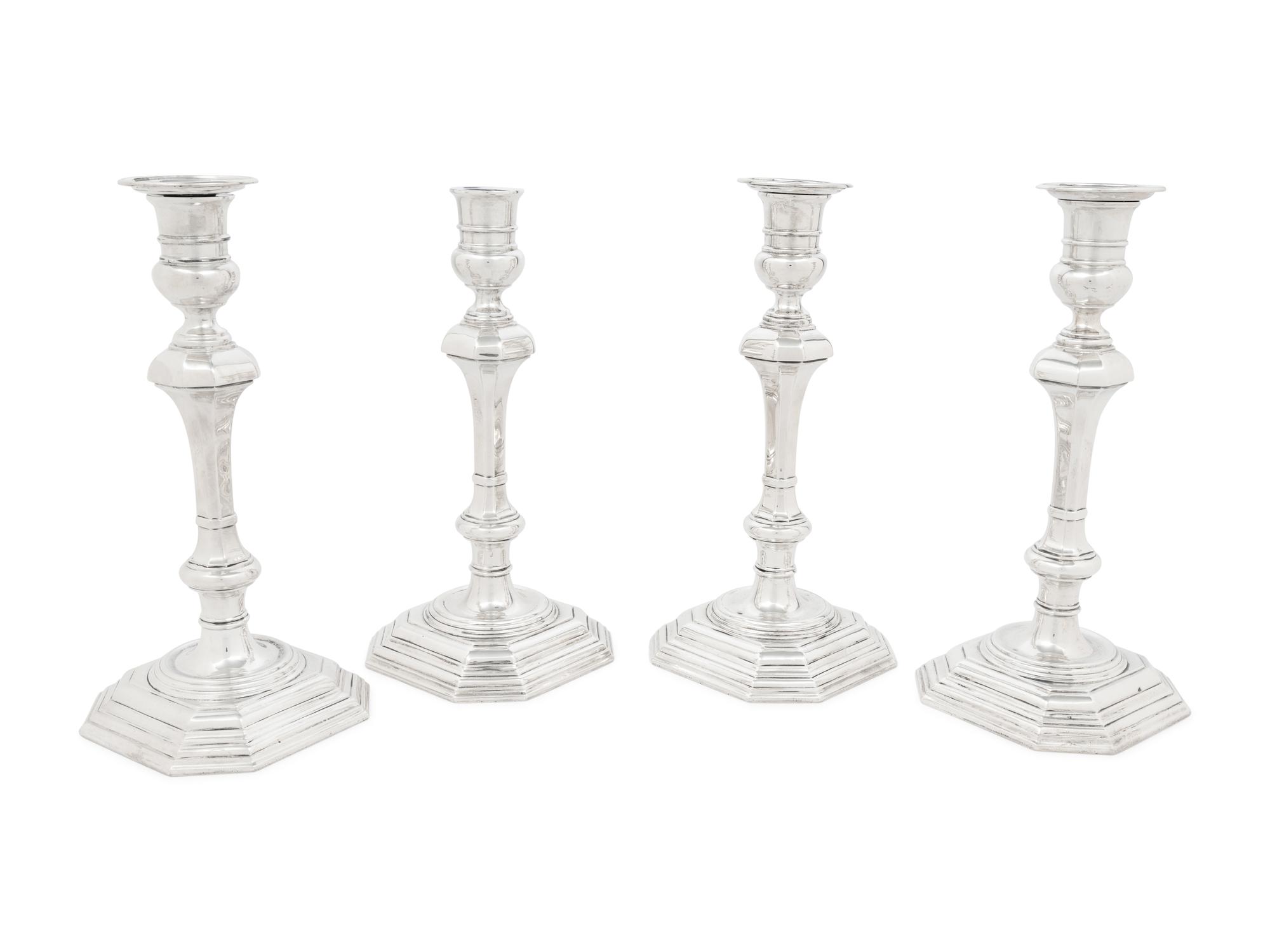 A Set of Four English Silver Candlesticks