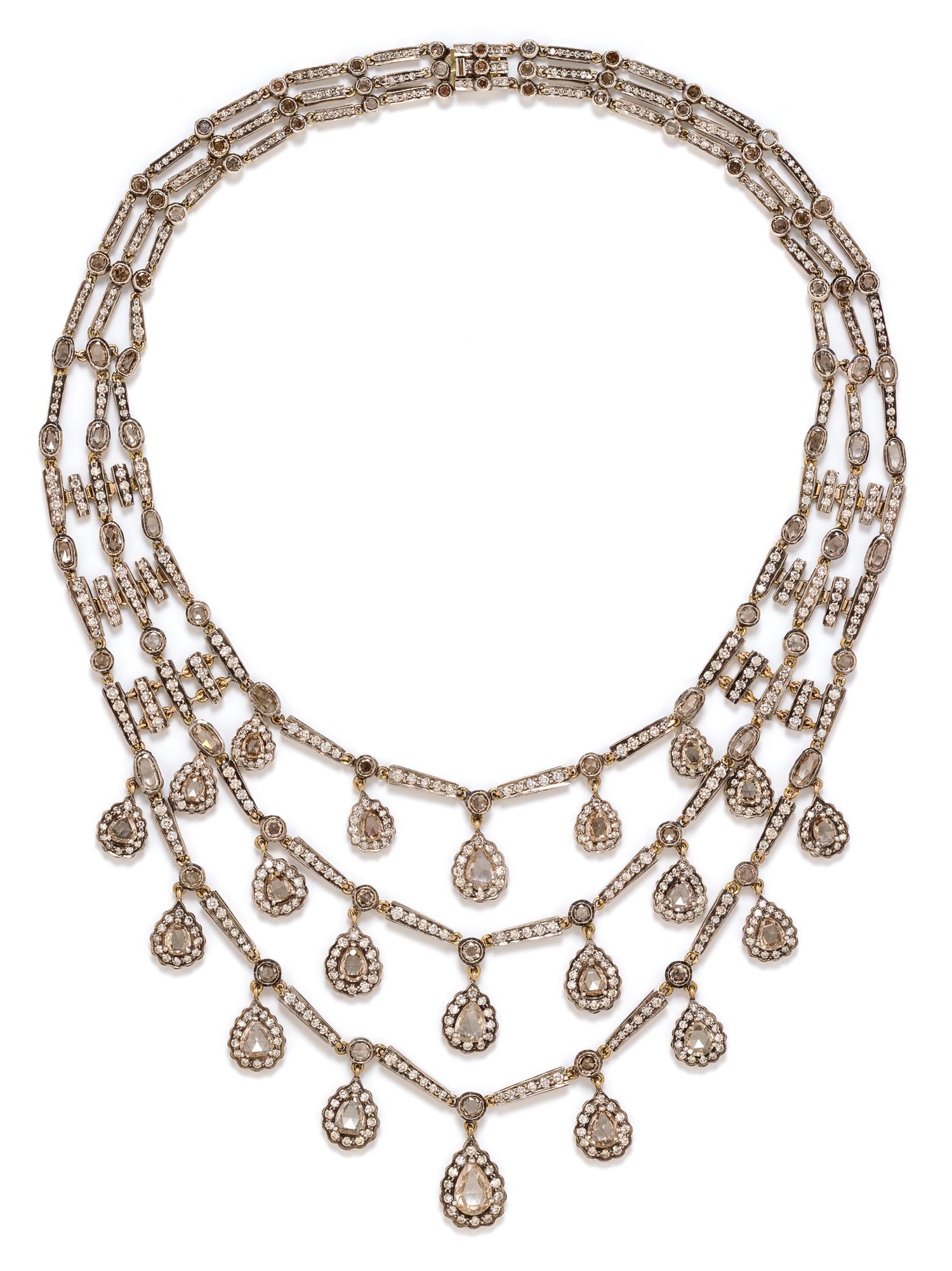 A Silver Topped Yellow Gold, Colored Diamond and Diamond Fringe Swag Necklace, 80.70 dwts.