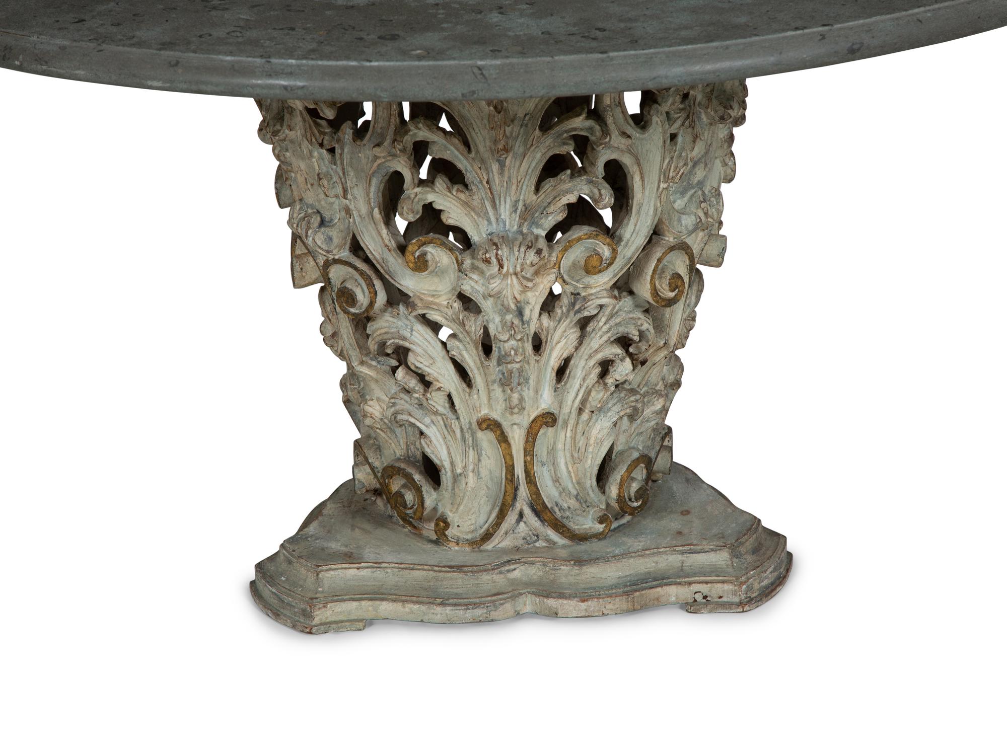 An Italian Baroque Style Grey-Painted and Parcel-Gilt Limestone-Top Center Table