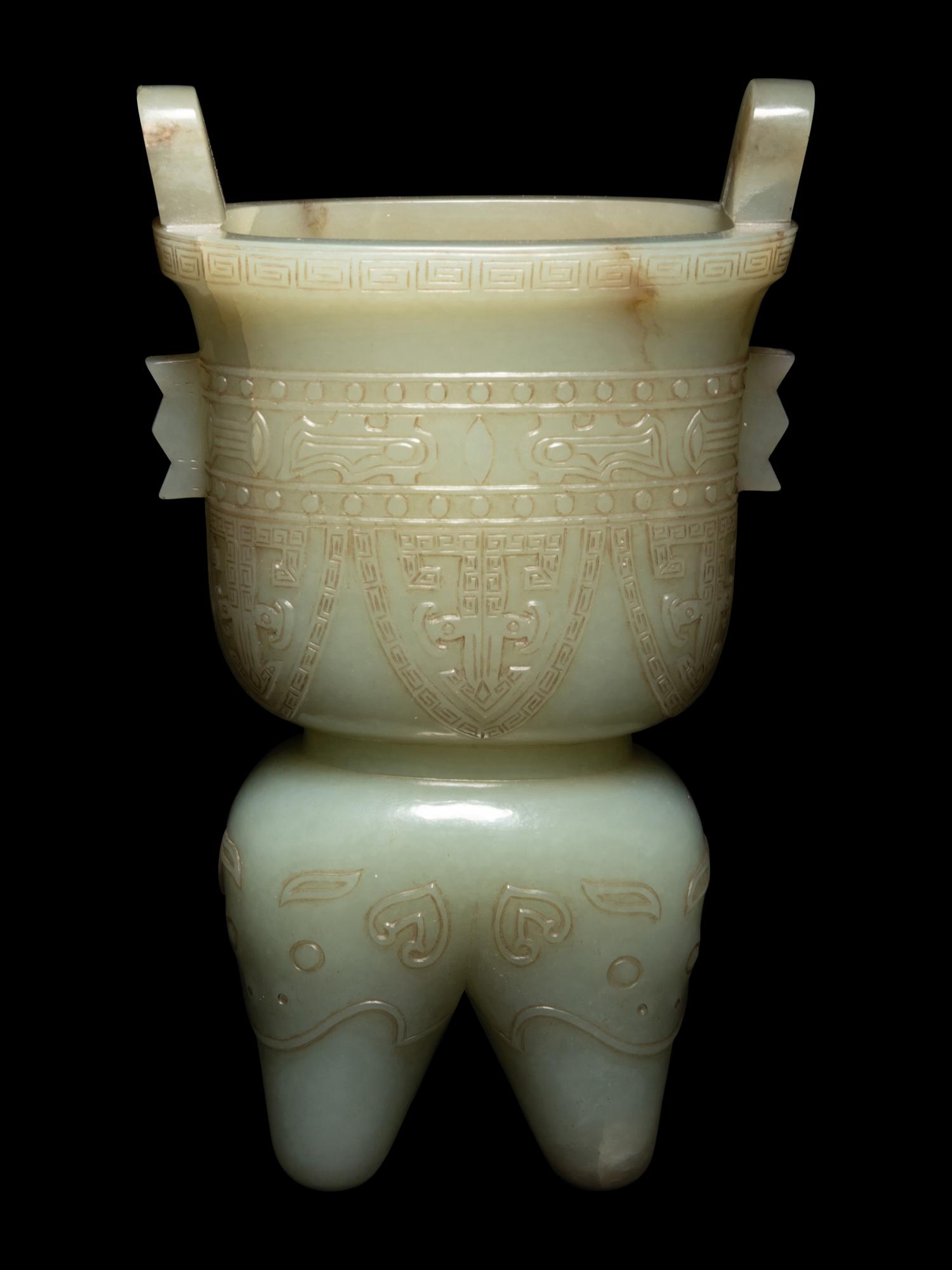 A Russet and Celadon Jade Li -Form Vessel