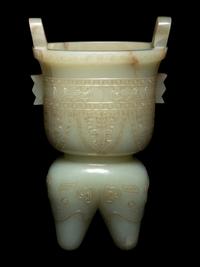 A Russet and Celadon Jade Li -Form Vessel