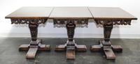 A Renaissance Revival Triple Pedestal Dining Table Height 29 1/2 inches. — CENTURY FURNITURE COMPANY, GRAND RAPIDS, MICHIGAN, 1900-1942