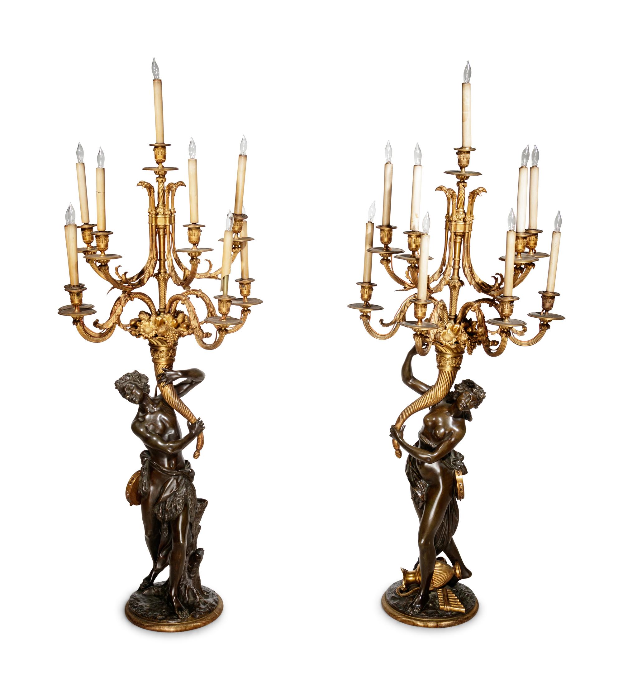 A Pair of Large Gilt and Patinated Bronze Figural Nine-Light Candelabra after the Models by Clodion